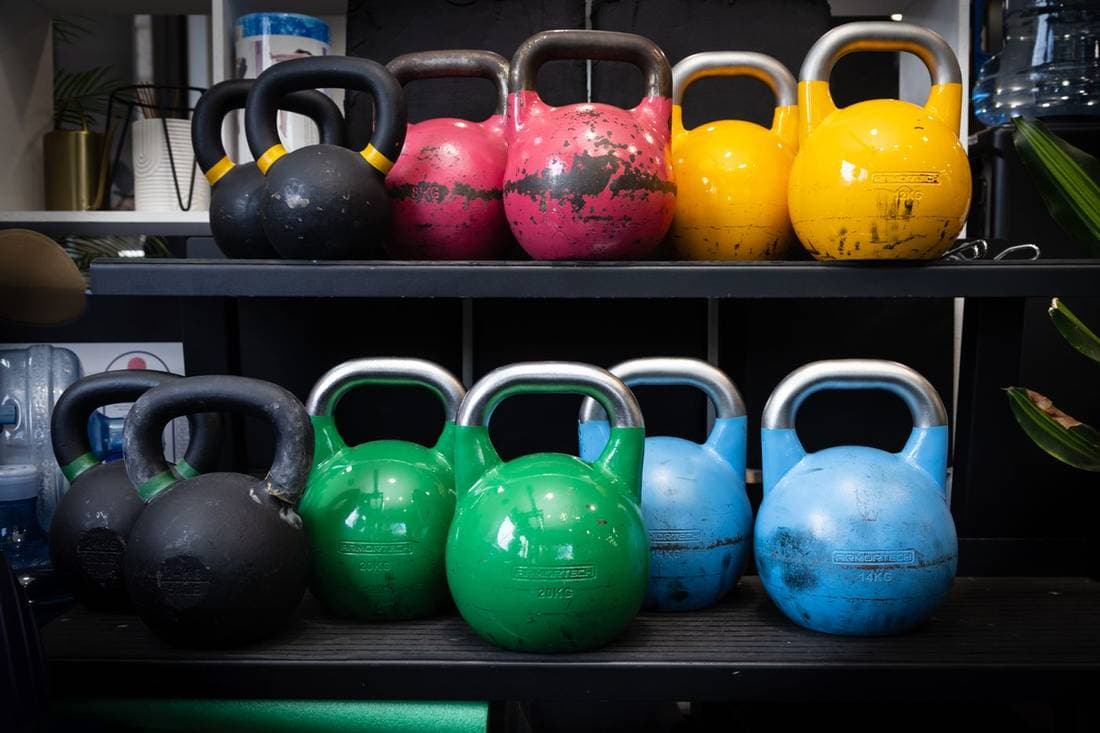 Kettlebells on a rack in the Move Physiotherapy Booragoon gym